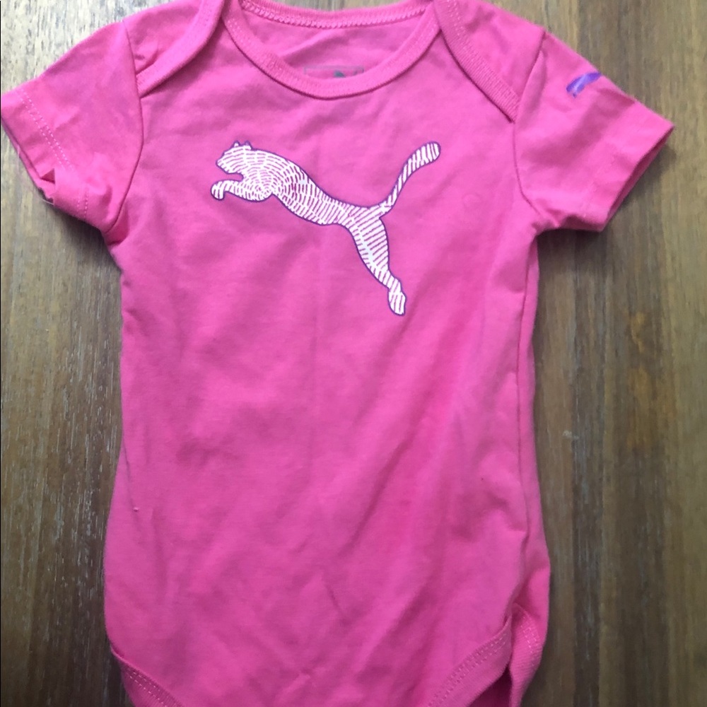 Pink puma onesie